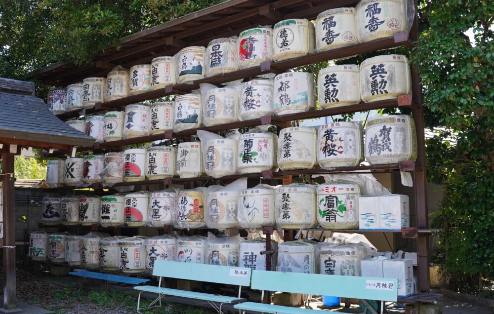 Sake barrels are lined up within the precincts of Umenomiya Taisha shrine